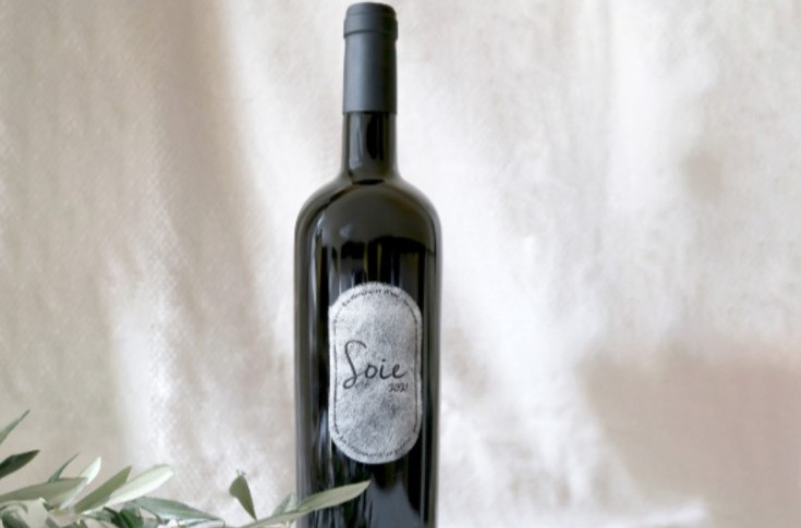 A wine labelled with silk